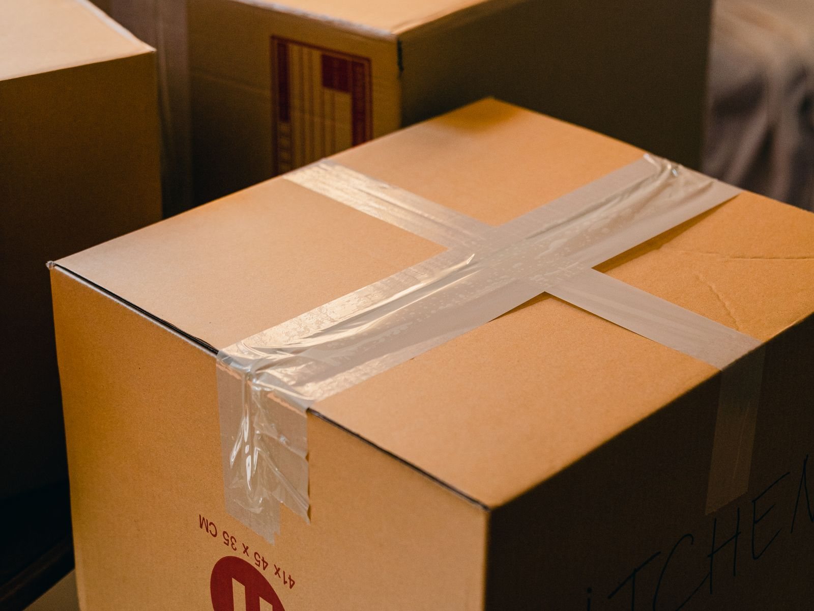 Taped boxes of household belongings ready to ship