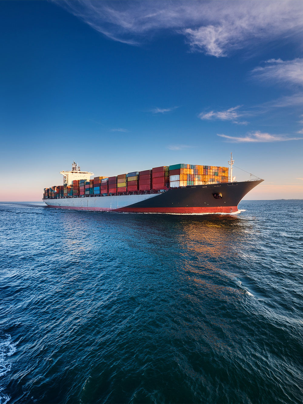 Cargo vessel transporting containers overseas